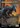 Grim Giganotosaurus (REX-036)  Foil - Jurassic World Collection (Borderless)