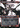 Capricious Hellraiser (Showcase) (Step-and-Compleat Foil) - Phyrexia: All Will Be One: (Showcase) (Borderless) Foil