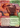 Hugs, Grisly Guardian (Showcase) (Borderless) - Bloomburrow